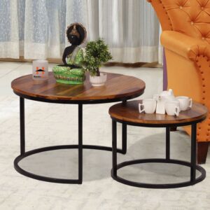 This modern nesting coffee table set features two round wood accent tables with a sturdy metal frame, perfect for any living room or office. Their sleek design offers versatility, allowing the tables to be used together or separately for a stylish, functional addition to your space. Easy to assemble.